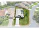 An aerial view with property lines of a single-Gathering home showcasing its tidy landscaping in a residential area at 9400 New Orleans Dr, Weeki Wachee, FL 34613