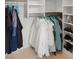 Spacious walk-in closet with organized hanging and shelving for optimal storage at 9400 New Orleans Dr, Weeki Wachee, FL 34613