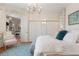Bright bedroom with stylish decor, ample closet space, and a comfortable seating area at 9400 New Orleans Dr, Weeki Wachee, FL 34613