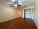 Bright bedroom shows a spacious closet and neutral walls to welcome a new homeowner at 947 Village Dr, Brooksville, FL 34601