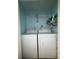 A functional laundry area, showcasing a washer and dryer for in-home laundry convenience at 947 Village Dr, Brooksville, FL 34601