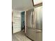 The pantry showcases ample storage shelves, providing functionality to the kitchen layout at 947 Village Dr, Brooksville, FL 34601