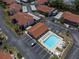 Aerial shot of community pool and parking showing the layout of the complex and amenities at 9970 Eagles Point Cir # 3, Port Richey, FL 34668