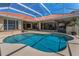 Wonderful backyard pool and patio with seamless indoor/outdoor living, great for relaxing and entertaining guests at 1033 Tuscany Dr, Trinity, FL 34655