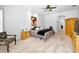 Bedroom with soft carpet, neutral walls, an accent painting, and a ceiling fan at 1033 Tuscany Dr, Trinity, FL 34655