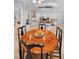 Dining area featuring an open design, connecting to the kitchen at 1033 Tuscany Dr, Trinity, FL 34655