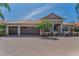 Attractive home featuring a well-maintained lawn, tile roof, and brick-paved driveway leading to a two-car garage at 1033 Tuscany Dr, Trinity, FL 34655