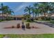 Charming home with a three car garage, brick paved driveway, and lush tropical landscaping at 1033 Tuscany Dr, Trinity, FL 34655