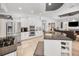 Bright kitchen with granite island, stainless appliances, and an open layout at 1033 Tuscany Dr, Trinity, FL 34655