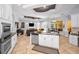 Spacious kitchen with an island and stainless appliances open to living space at 1033 Tuscany Dr, Trinity, FL 34655