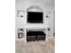 Close up of the living room built-ins, including a fireplace and shelving at 1033 Tuscany Dr, Trinity, FL 34655