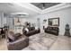 Open concept living room featuring modern furnishings, and seamless integration with kitchen and dining areas at 1033 Tuscany Dr, Trinity, FL 34655
