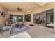 The screened-in patio is great for entertaining, featuring a dining area and seamless indoor/outdoor living at 1033 Tuscany Dr, Trinity, FL 34655