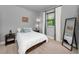 Cozy bedroom with soft carpet, ample natural light, and tasteful decor at 12800 Solola Way, Trinity, FL 34655