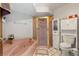 Bathroom featuring corner shower, soaking tub, and decorative tile at 13469 Pia Ct, Spring Hill, FL 34609