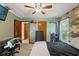 Bedroom featuring camouflage accent wall and standard closet at 13469 Pia Ct, Spring Hill, FL 34609
