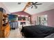 Large main bedroom with ensuite bathroom and sliding glass door to the backyard at 13469 Pia Ct, Spring Hill, FL 34609