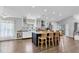 Bright kitchen with large island, stainless steel appliances, and white cabinetry at 14105 Agua Clara Dr, Hudson, FL 34667