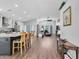 Open concept living room with hardwood floors and high ceilings at 14105 Agua Clara Dr, Hudson, FL 34667
