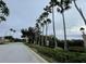 A street view of the manicured neighborhood in the Beacon Point community at 14105 Agua Clara Dr, Hudson, FL 34667