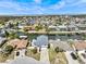 Aerial view of the home in a waterfront neighborhood, conveniently located on a canal at 15535 Allmand Dr, Hudson, FL 34667