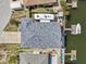 Overhead view of the house with boat dock access, RV parking, and serene backyard at 15535 Allmand Dr, Hudson, FL 34667