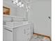 Modern bathroom featuring double sinks, and plenty of vanity storage at 15535 Allmand Dr, Hudson, FL 34667