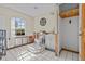 Bathroom with tile flooring, large window, and accessible design at 15535 Allmand Dr, Hudson, FL 34667