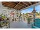 Inviting porch with waterfront views, ample seating, and decorative nautical accents at 15535 Allmand Dr, Hudson, FL 34667