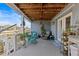 Comfortable porch with seating and views of the waterway at 15535 Allmand Dr, Hudson, FL 34667