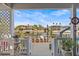 Stunning waterfront view of canal homes from a charming porch with nautical accents at 15535 Allmand Dr, Hudson, FL 34667