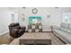 Comfortable living room featuring stylish decor and ample seating for relaxing and entertaining guests at 18441 Whitacre Cir, Hudson, FL 34667