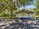 Carport with a concrete driveway at 196 Lark Ave, Brooksville, FL 34601