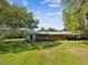 View of the house and covered parking at 196 Lark Ave, Brooksville, FL 34601