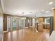 Open floorplan showcasing kitchen and dining area with hardwood flooring and ample lighting at 196 Lark Ave, Brooksville, FL 34601
