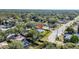 Aerial view of the neighborhood showcasing mature trees, nearby roads, and the location of the property at 2116 Karan Way, Clearwater, FL 33763