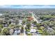 Expansive aerial view of a residential neighborhood, showcasing lush greenery and homes at 2116 Karan Way, Clearwater, FL 33763