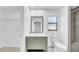 Charming bathroom with a vintage vanity and a walk-in shower at 2116 Karan Way, Clearwater, FL 33763