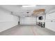 Spacious garage with ample storage space and potential for a workshop area at 2116 Karan Way, Clearwater, FL 33763
