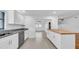 Bright kitchen boasts stainless steel appliances, granite countertops, and a convenient center island at 2116 Karan Way, Clearwater, FL 33763