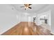 Spacious living room with hardwood floors and an adjacent kitchen area at 2116 Karan Way, Clearwater, FL 33763