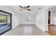 Additional living space with tile floor, slider door, and accent trim at 2116 Karan Way, Clearwater, FL 33763