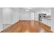 Spacious living room with hardwood floors and ample natural light, perfect for entertaining or relaxing at 2116 Karan Way, Clearwater, FL 33763