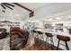 Open-concept kitchen featuring a large island with bar seating, modern appliances, and ample counter space at 2254 Coachman Rd, Spring Hill, FL 34608