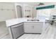 Beautiful kitchen island featuring stainless steel appliances and a double sink at 2325 Pleasant Hill Ln, Holiday, FL 34691