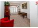 Inviting living room with plush carpeting, plantation shutters, and stylish, vintage furnishings at 2325 Pleasant Hill Ln, Holiday, FL 34691