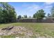Spacious backyard with mature trees and plenty of room to enjoy at 27198 Simona Ave, Brooksville, FL 34602