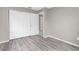 Bedroom with large closet space and light wood floors at 27198 Simona Ave, Brooksville, FL 34602