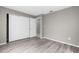 Bedroom with large closet space and light wood floors at 27198 Simona Ave, Brooksville, FL 34602