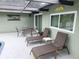 Outdoor patio area with lounge chairs for relaxation and enjoyment at 273 Gulfport Ln, Spring Hill, FL 34608
